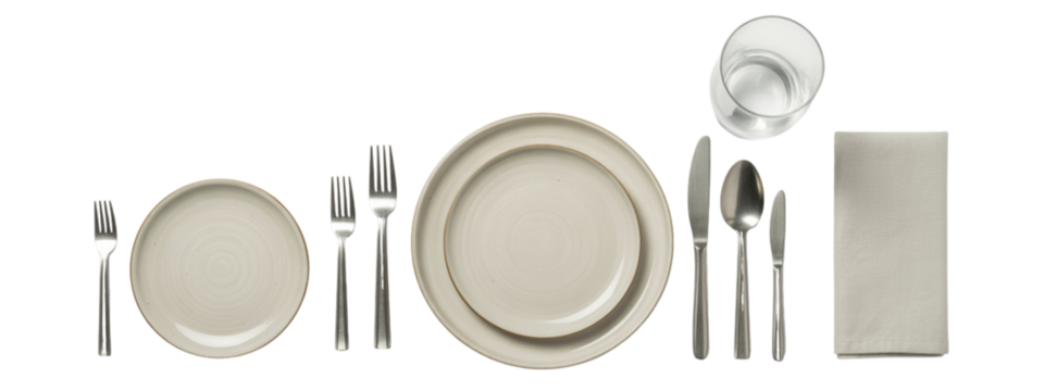 Elegant neutral place setting for dining featuring plates, silverware, a napkin and glass of water creating a modern and sophisticated table arrangement ready for a delicious meal