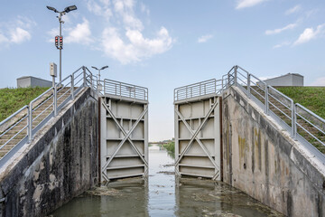 closing doors of lock on Brenta canal, Stra, Italy