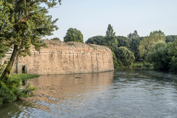 Fototapeta premium Castelnuovo dungeon and city walls on Piovene canal, Padova, Italy