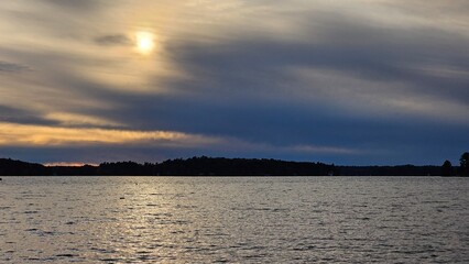 Naklejka premium sunset over lake