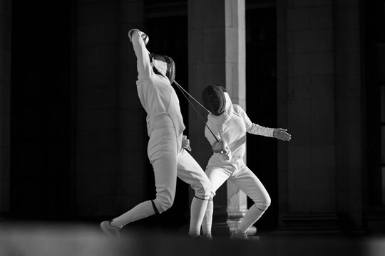 Fencing in the castle. Fencer womens.