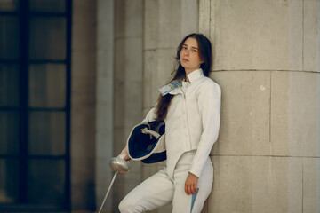 Fencing in the castle. Fencer womens.