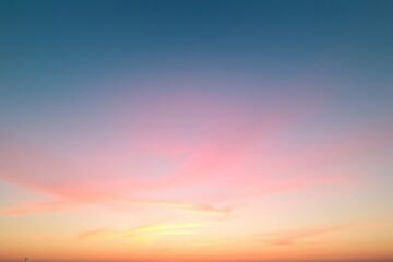 Generative AI tranquil sky gradient with pink and blue hues.