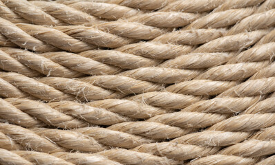 Natural jute rope texture close up background for design and craft concept
