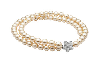 Isolated champagne-colored pearl necklace, two rows of elegant shiny beads with silver clasp