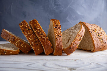homemade buckwheat bread on a wooden white table