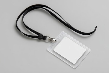 Blank ID badge on gray surface