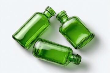 Fototapeta premium Three green glass bottles on white background (3)