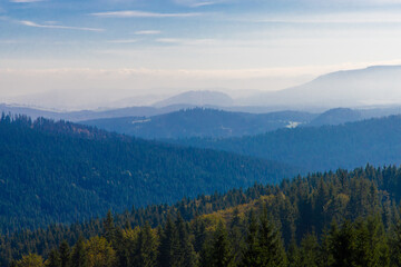 Aerial view of the mountain peak on a foggy day
