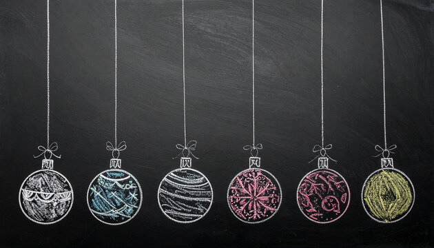 Chalkboard Christmas ornaments with colorful hand drawn baubles hanging in festive holiday decoration