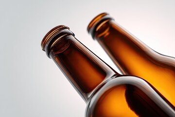 Close-up of two amber beer bottles