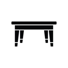 Simple black silhouette of a rectangular table with four legs