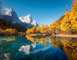 Beautiful view of the amazing trees reflected on the water surface of Moon Lake in autumn with crystal clear sky and a green field foreground