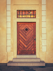 Historic wooden and metal doors with artistic details