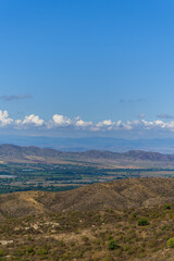 Amazing landmark with settlements and mountains and cloudy sky at Armenia-Georgia state border