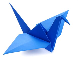 Blue origami crane on white