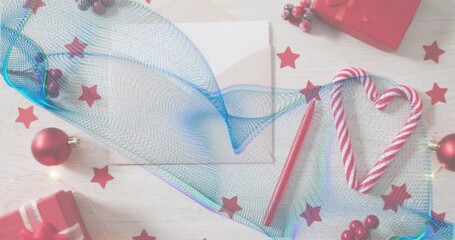Mesh wave flowing from left across envelope wrapping candy-cane heart linking ornaments drifting - Powered by Adobe