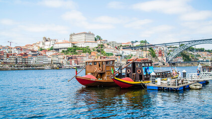 Fototapeta premium Porto, Portugal - July 10 2025: The picturesque landscape of river shore of Douro River in Portugal