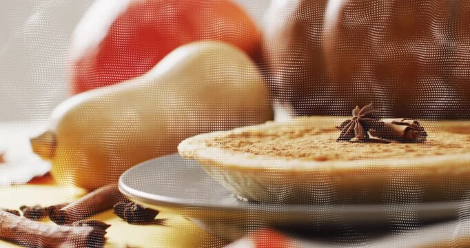 Camera panning down and right revealing pumpkin pie with spices, spoons forming autumn still life