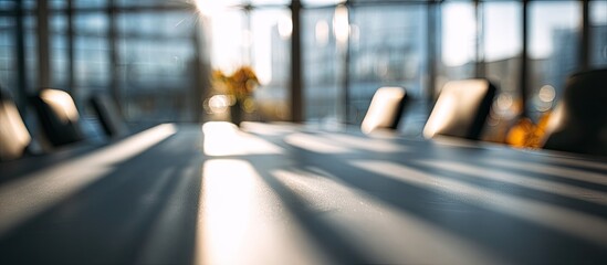 Fototapeta premium Sunlit, blurred conference room