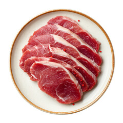 Fototapeta premium Fresh raw lamb chop slices arranged neatly on a rustic ceramic plate ready for cooking isolated on transparent background