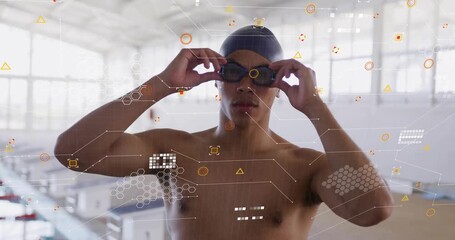 Technology HUD panels appearing around swimmer chest or head guiding him adjusting goggles before sw - Powered by Adobe