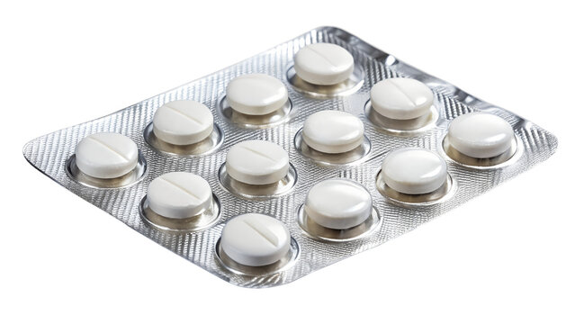Closeup of a blister pack of white round pills isolated on transparent background, representing medication, healthcare, and pharmaceutical industry