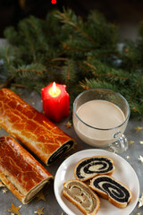 Traditional holiday beigli with walnuts, poppy seeds, and coffee with milk