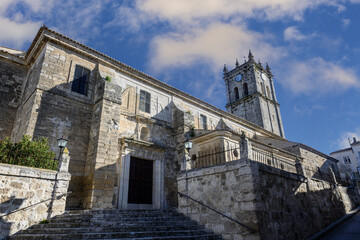 Fototapeta premium Main facade of San Millan Church in Baltanas under blue sky