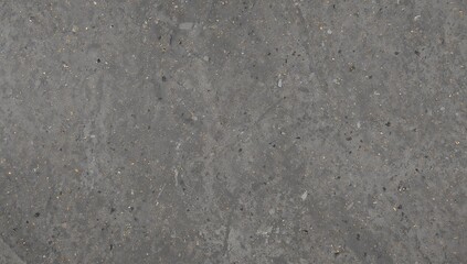 Close up macro texture of a rough grey concrete surface with subtle imperfections and fine grain