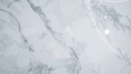 Elegant light gray and white marble texture with subtle veining and a soft sheen