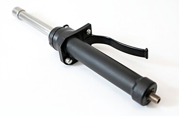 Professional lever action grease gun with metal tube and black handle, designed for efficient lubrication and mechanical maintenance. Isolated on clean white background.