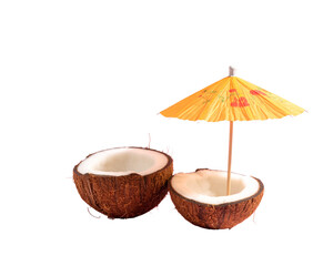 Tropical beach concept made of coconut fruit and sun umbrella. Creative minimal summe 
