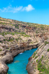 Beautiful view of Wied il-Ghasri (Ghasri valley) sea canyon on the north coast of Gozo Island, Malta