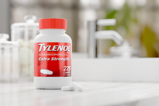 Riverside Country, California USA - September 25, 2025 - Bottle of Tylenol and Caplet Pills Acetaminophen Prescription Medicine Pain Reliever and Fever Reducer on Countertop