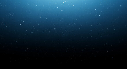 Deep blue abstract background with floating particles and light rays. Underwater bokeh effect and dark gradient texture.