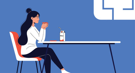 A woman enjoys a hot beverage while sitting at a table with a drink bottle.