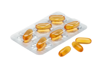 Isolated blister pack with omega-3 capsules and some loose supplements next to it on table
