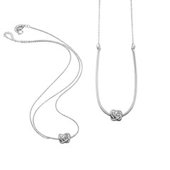 Elegant silver knot necklaces with delicate chains isolated on transparent background