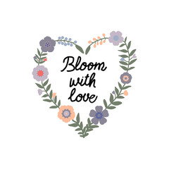 Heart shaped floral wreath with inspirational text.