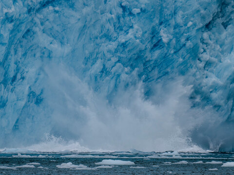 Capturing the explosion of water as ice sheets calve off the Aialak Glacier