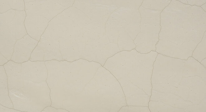 Light beige concrete wall texture with soft cracks, minimalist modern background