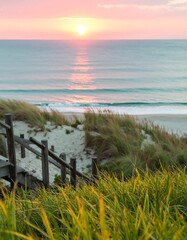 Sunrise beach scene with dunes