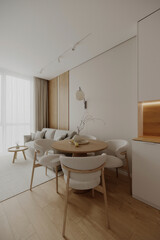 Stylish dining area featuring minimalist design, wood flooring, and modern furnishings.