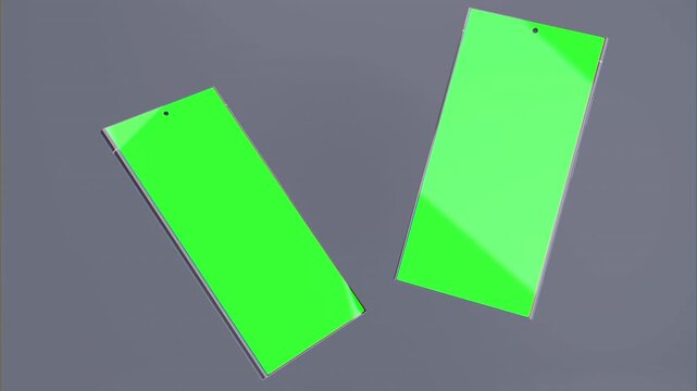 Two Green Screen Protectors on Gray Background - A Close-Up Look.