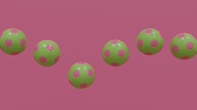 Abstract 3d background with green football balls lined up in a straight row, bouncing smoothly on a pink surface, producing abstract rhythmic composition with minimal vibrant energy