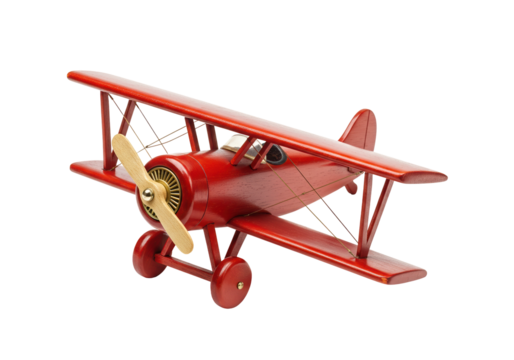 Red wooden toy biplane isolated on transparent background, vintage airplane model for kids