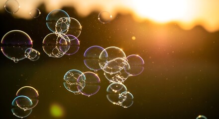 Dreamy and joyful soap bubbles, glistening in golden sunlight
