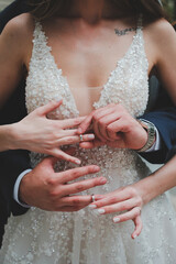 bride and groom holding hands