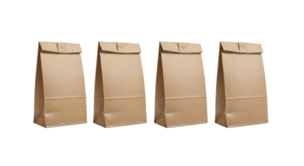 Four identical, blank brown kraft paper bags in a linear row on a transparent isolated background, professional studio product shot with no shadows, sharp focus. Concept for packaging display